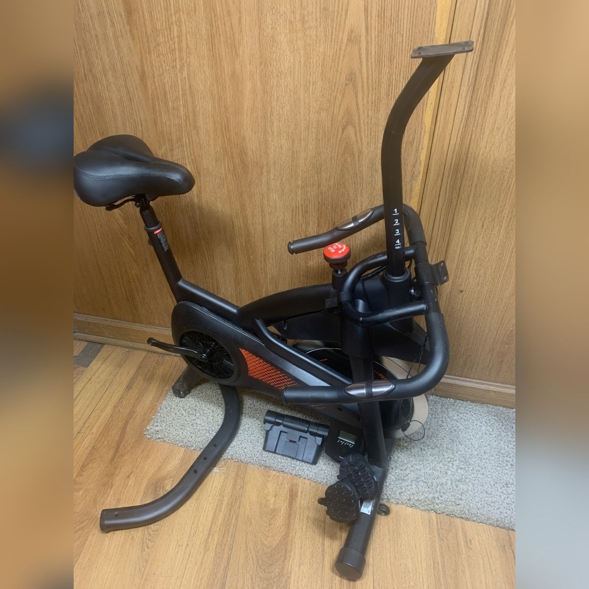 Spin Bike, Black Frame with Orange Accents, Resistance Knob and Console - New – Opelousas, LA